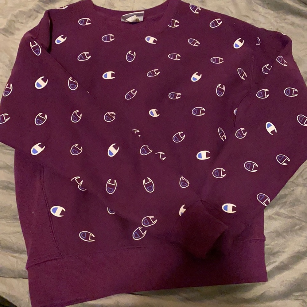 Purple Champion sweater .
